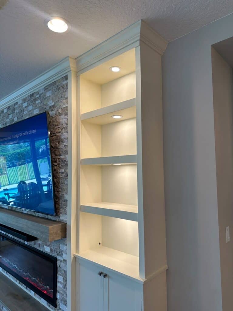 Custom built-in shelves with integrated LED lighting