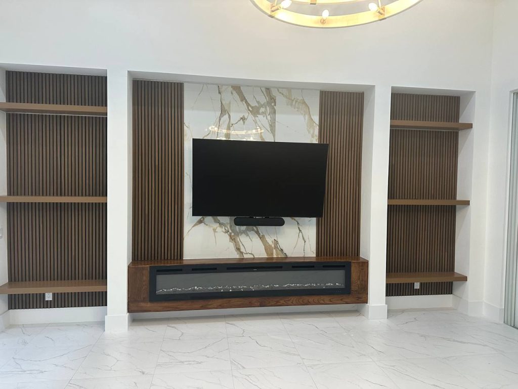 Luxury marble media wall with linear fireplace and LED niches